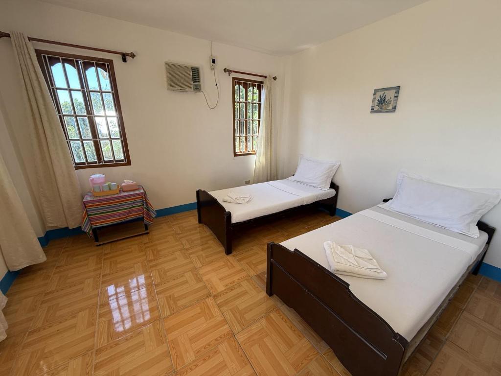 Postel nebo postele na pokoji v ubytování Casa Aureola