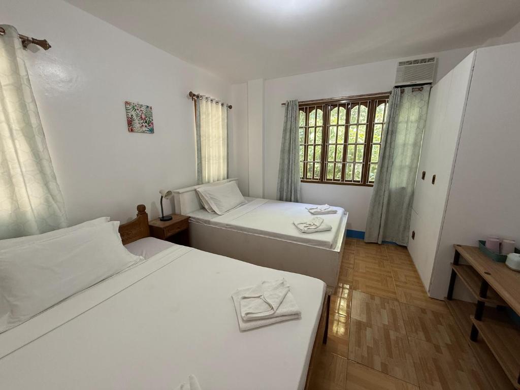 Postel nebo postele na pokoji v ubytování Casa Aureola