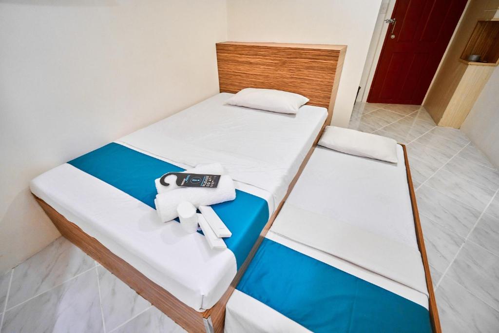 Postel nebo postele na pokoji v ubytování Circuit Hostel
