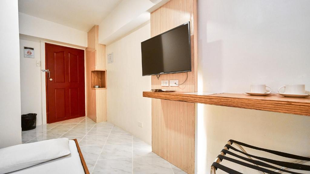 TV a/nebo společenská místnost v ubytování Circuit Hostel