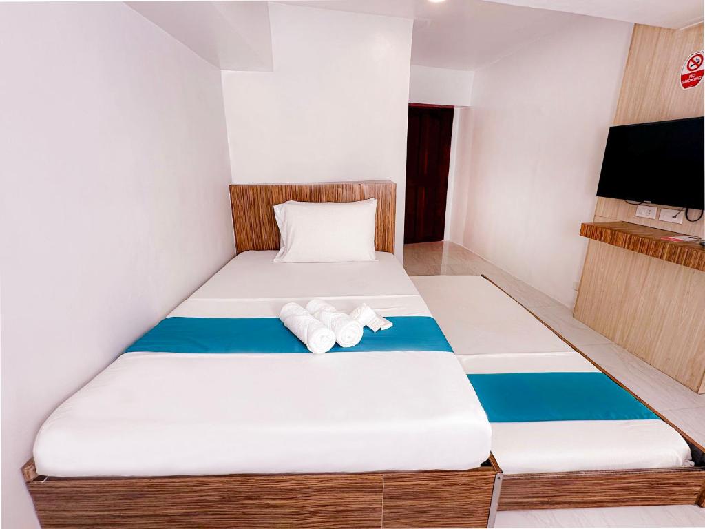 Postel nebo postele na pokoji v ubytování Circuit Hostel