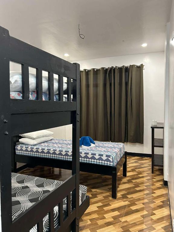 Postel nebo postele na pokoji v ubytování Seaslugs Travellers Inn
