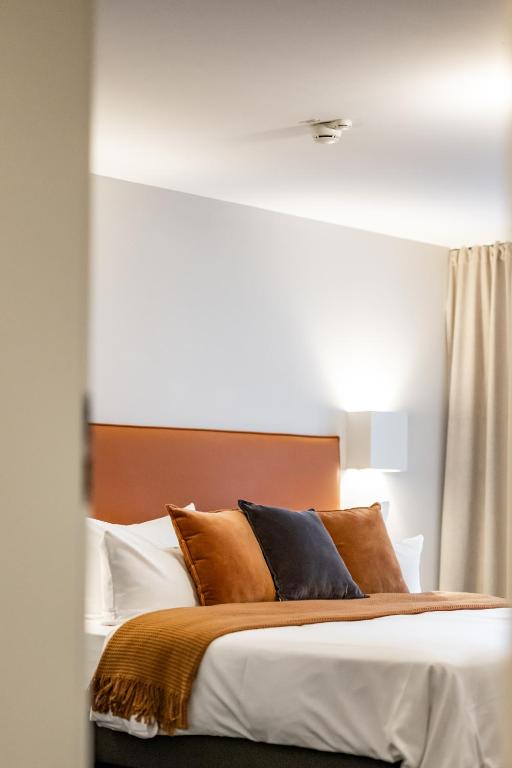 Postel nebo postele na pokoji v ubytování Hotel Goldene Steig