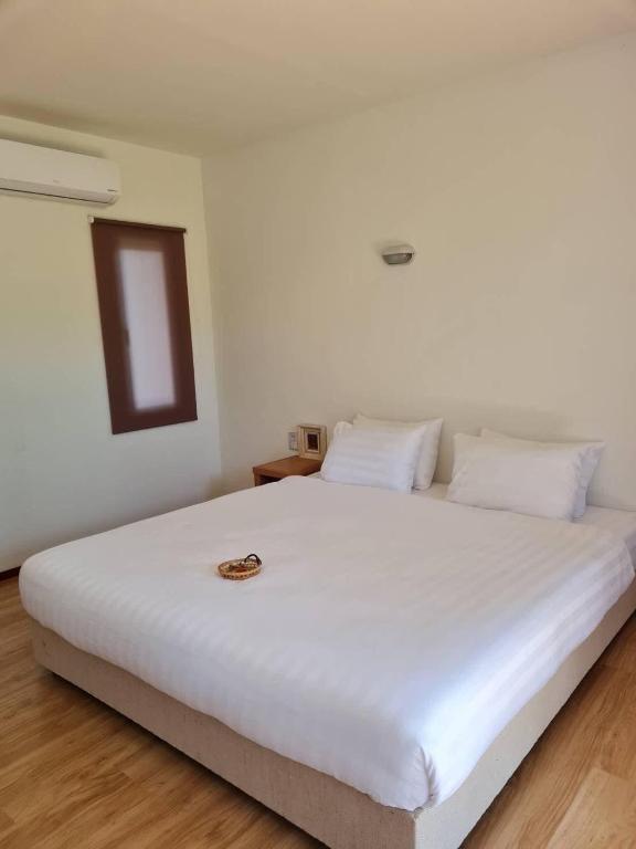 Postel nebo postele na pokoji v ubytování Chong khaep aingkwai resort Saiyok