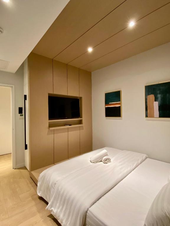 Postel nebo postele na pokoji v ubytování Showcase Hotel Kota Kinabalu