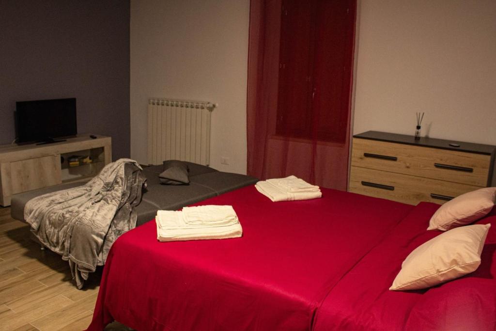 Postel nebo postele na pokoji v ubytování 1375 Suites