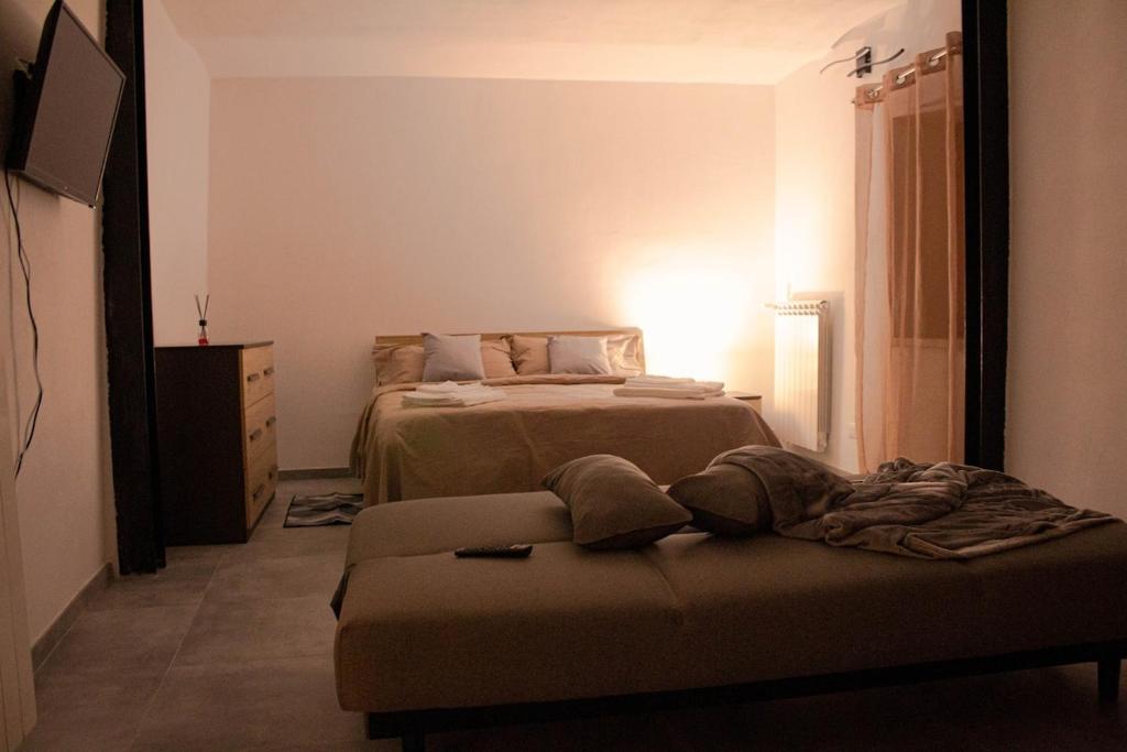 Postel nebo postele na pokoji v ubytování 1375 Suites