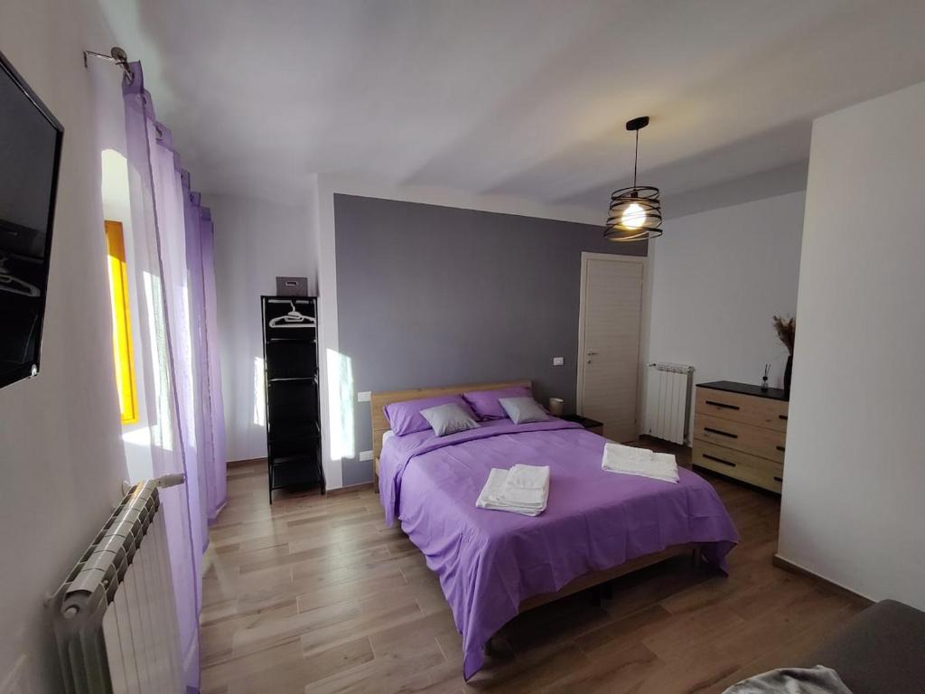 Postel nebo postele na pokoji v ubytování 1375 Suites