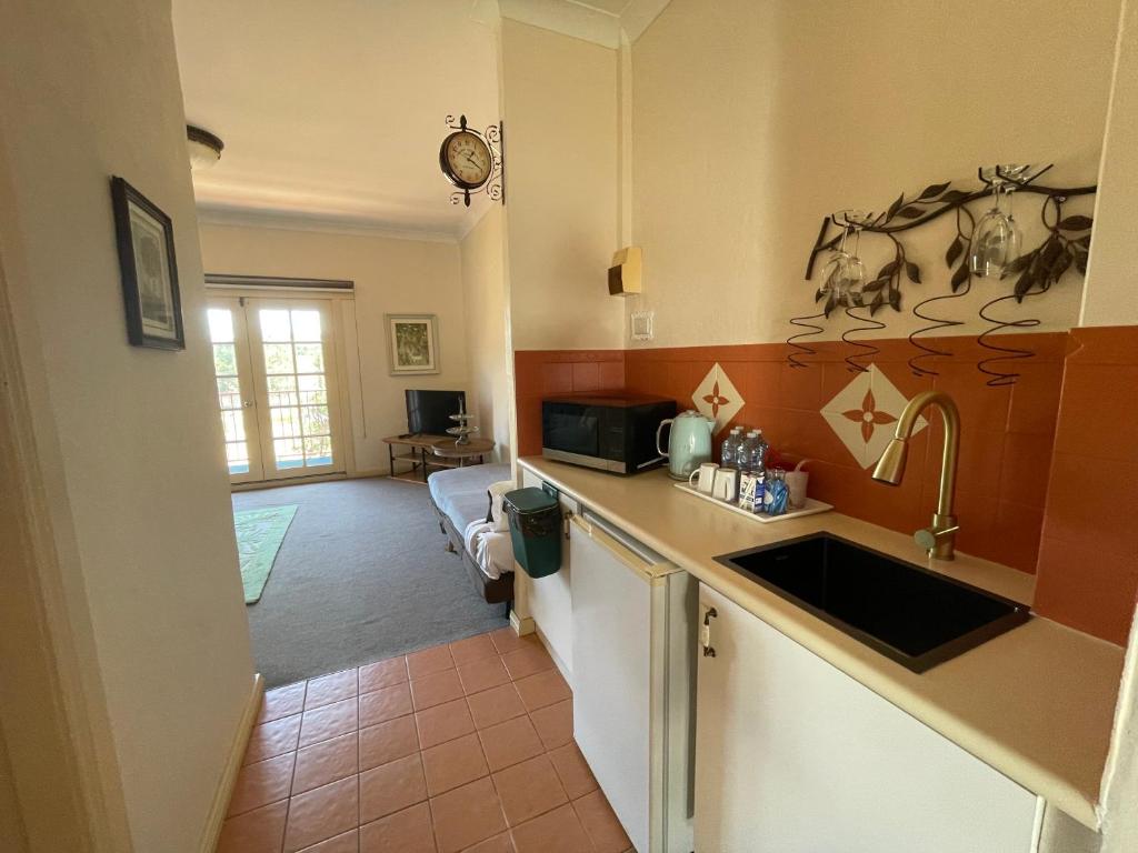 Kuchyň nebo kuchyňský kout v ubytování Villa Provence