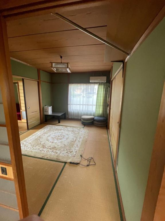 Postel nebo postele na pokoji v ubytování KOMUGi