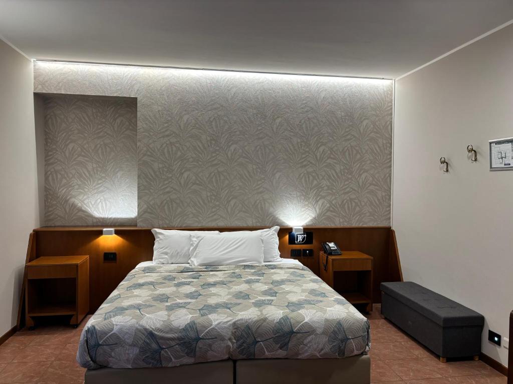 Postel nebo postele na pokoji v ubytování Villa Nasti Hotel Ristorante