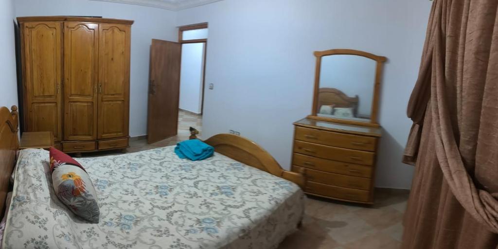 Un pat sau paturi într-o cameră la Piso