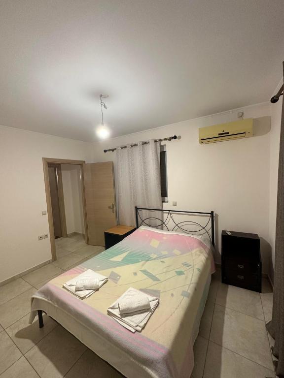 Postel nebo postele na pokoji v ubytování Green House Messini