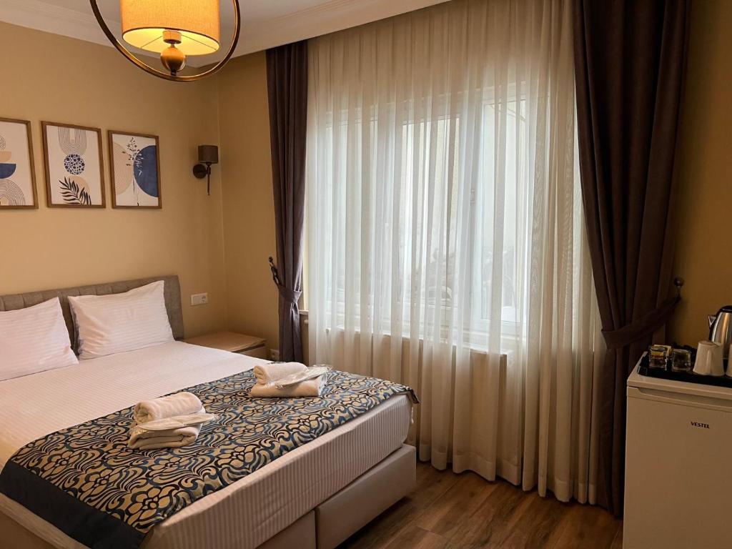 Postel nebo postele na pokoji v ubytování Sultanahmet inn Hotel