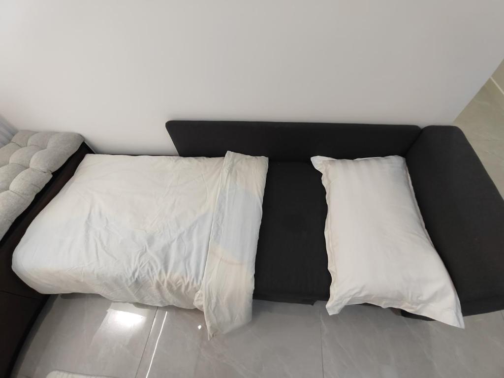 Postel nebo postele na pokoji v ubytování Bay Suite - Minuli