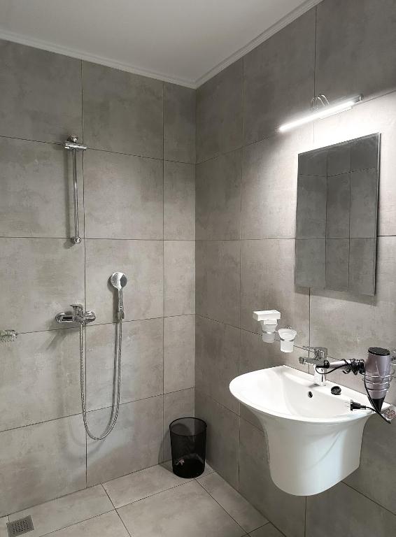 Koupelna v ubytování Acacus Apartment