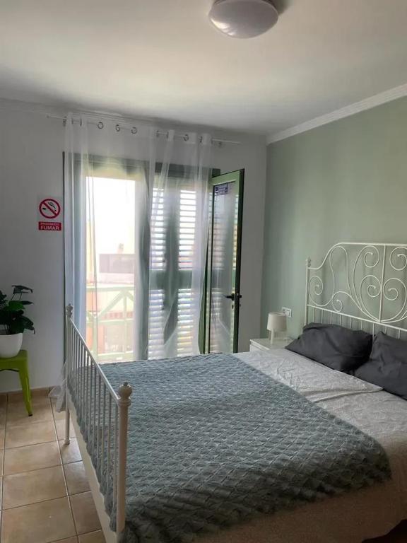 Posteľ alebo postele v izbe v ubytovaní Modern apartment in Caleta de Fuste 60m² with shared pool
