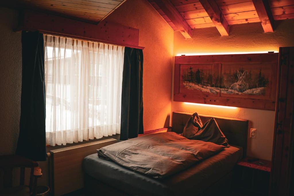 Postel nebo postele na pokoji v ubytování Pension Sonne