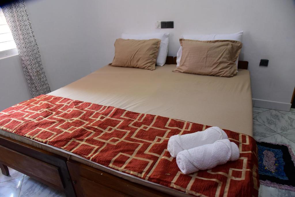 Postel nebo postele na pokoji v ubytování Happy Tuna Guesthouse