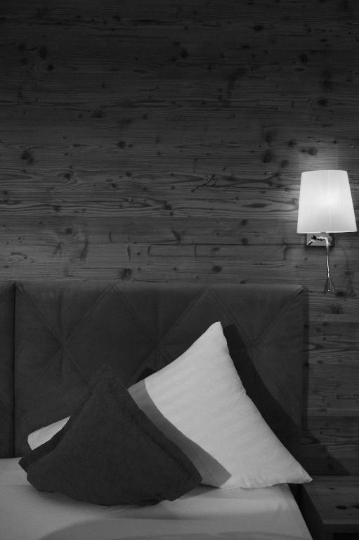 Posteľ alebo postele v izbe v ubytovaní Hotel Sonnalp