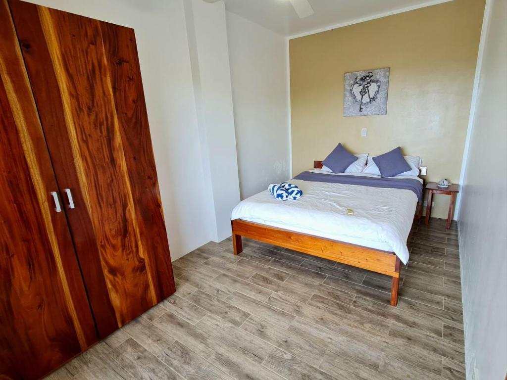 Postel nebo postele na pokoji v ubytování Tablas Seaview Homestay