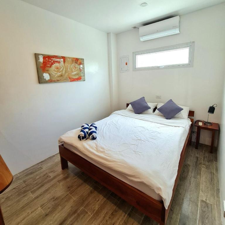 Postel nebo postele na pokoji v ubytování Tablas Seaview Homestay