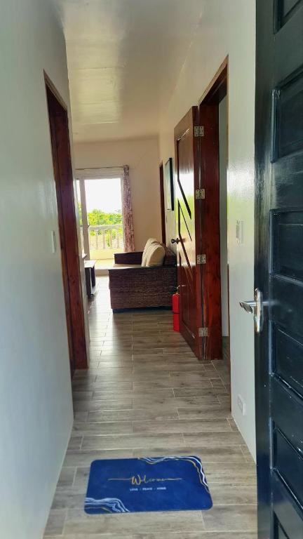 Postel nebo postele na pokoji v ubytování Tablas Seaview Homestay