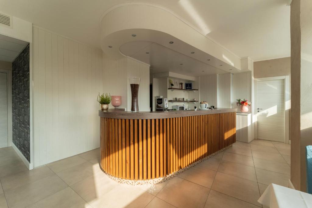 Kuchyň nebo kuchyňský kout v ubytování Hotel Donatello
