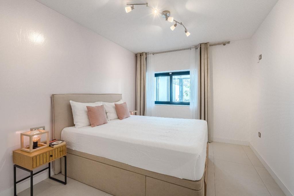 Postel nebo postele na pokoji v ubytování Villa CACTUS Tenerife