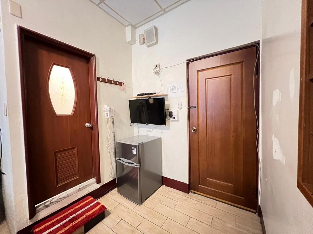 TV a/nebo společenská místnost v ubytování Wayu House