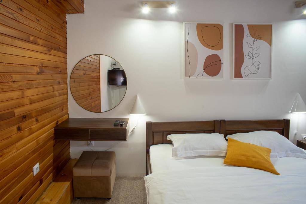 Postel nebo postele na pokoji v ubytování MB Hotel