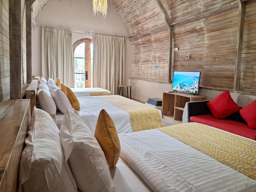 Postel nebo postele na pokoji v ubytování Grand Daghan Cottage
