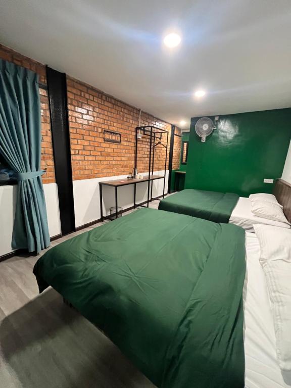 Postel nebo postele na pokoji v ubytování Big Dreams Hotel