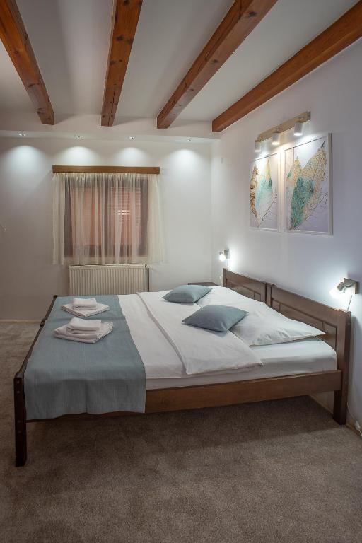 Postel nebo postele na pokoji v ubytování MB Hotel