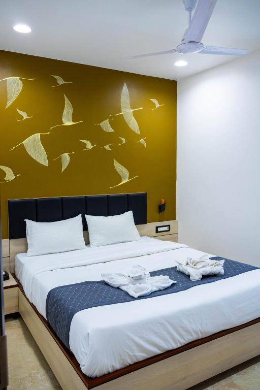 Postel nebo postele na pokoji v ubytování The Executive Inn