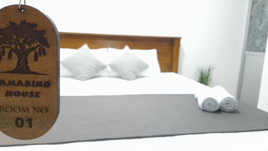 A bed or beds in a room at TaMaRiNd house