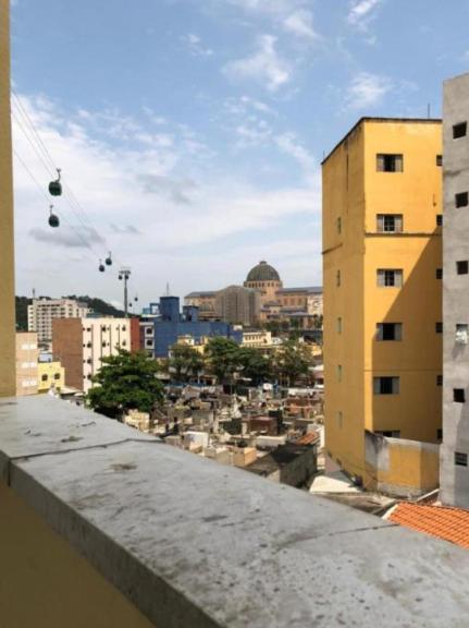 a view of a city from the roof of a building at Pousada MC in Aparecida