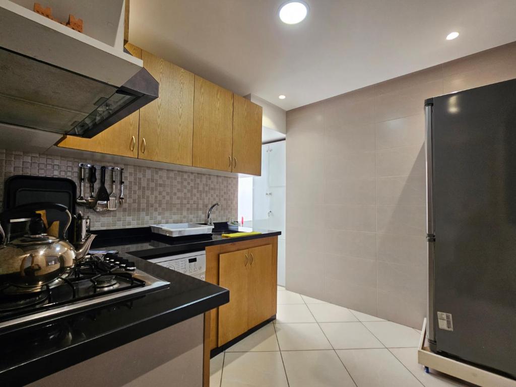 Kuchyň nebo kuchyňský kout v ubytování Appartement Al Amal