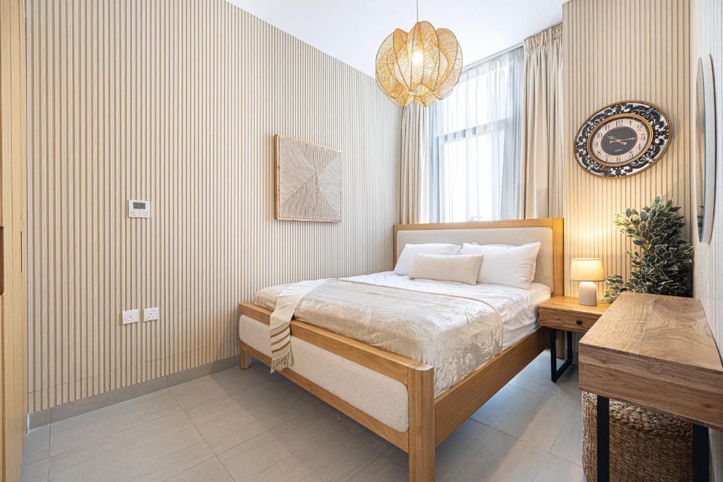 Letto o letti in una camera di 1BR The Monarch Suite by Blue Cloud Holidays