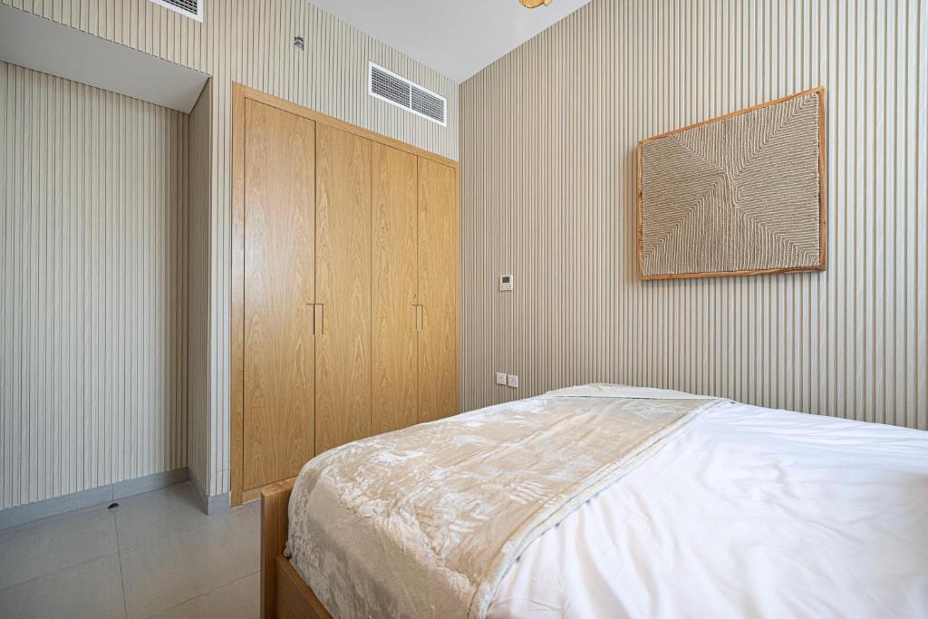 Letto o letti in una camera di 1BR The Monarch Suite by Blue Cloud Holidays