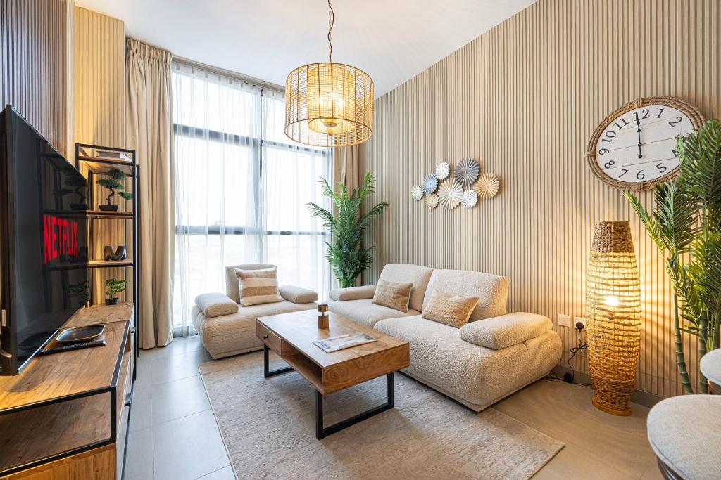 TV o dispositivi per l'intrattenimento presso 1BR The Monarch Suite by Blue Cloud Holidays