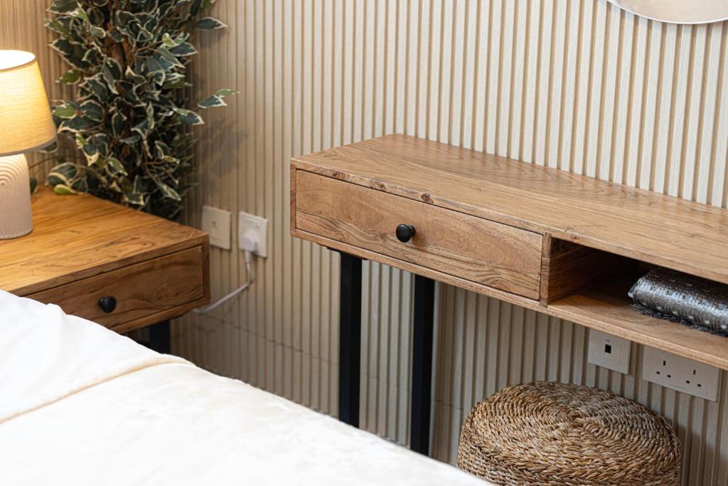 Letto o letti in una camera di 1BR The Monarch Suite by Blue Cloud Holidays