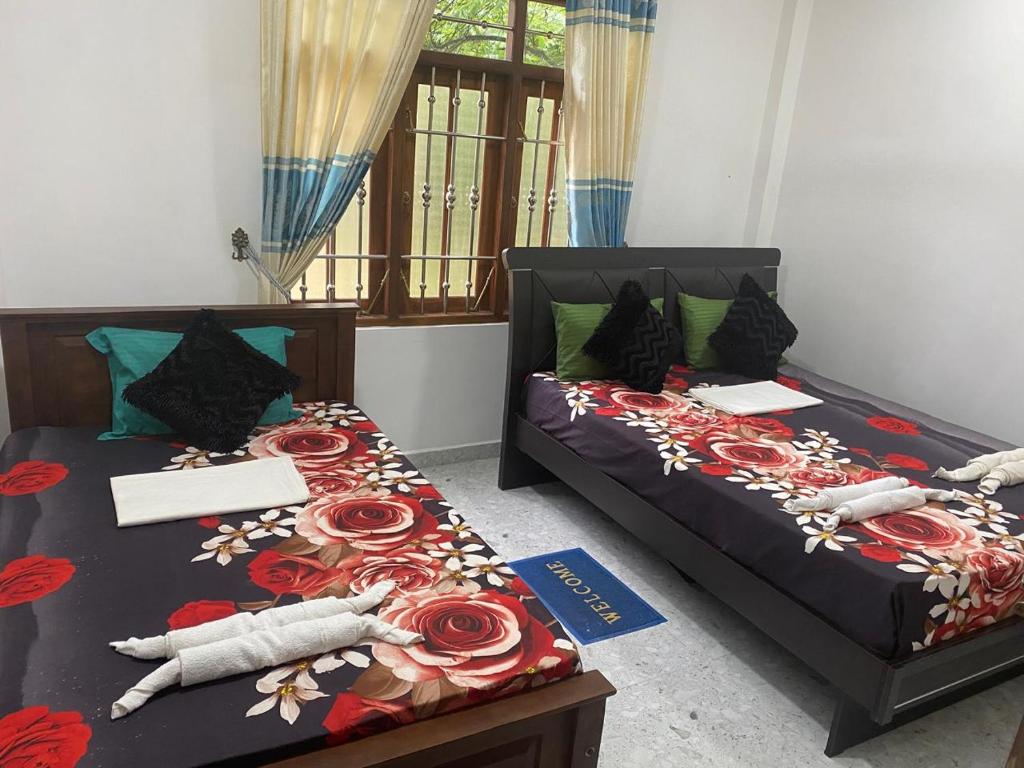 Postel nebo postele na pokoji v ubytování Haritha Resort Yala