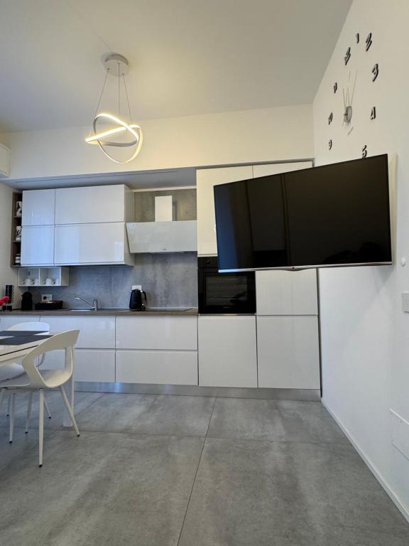 Kuchyň nebo kuchyňský kout v ubytování B&B Prestige