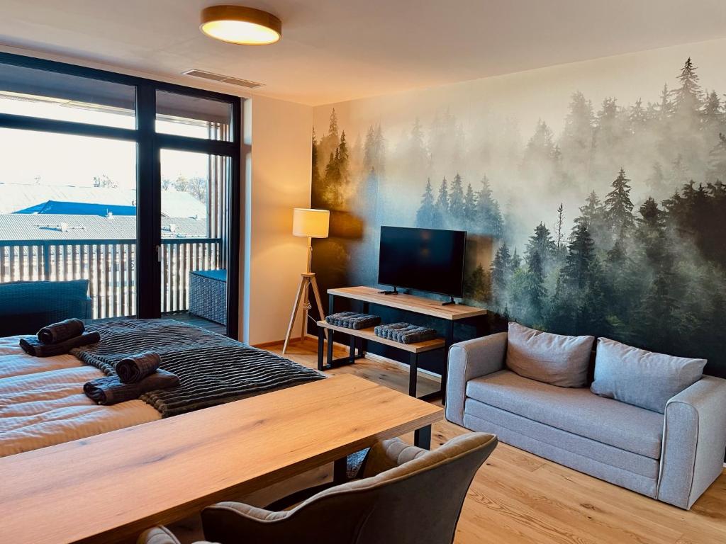 TV a/nebo společenská místnost v ubytování Tee House - Forest Apartment Čeladná