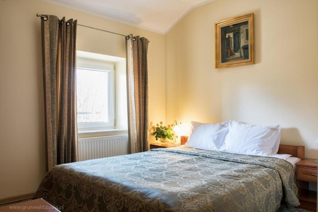 Postel nebo postele na pokoji v ubytování HOTEL I RESTAURACJA BROCHÓW