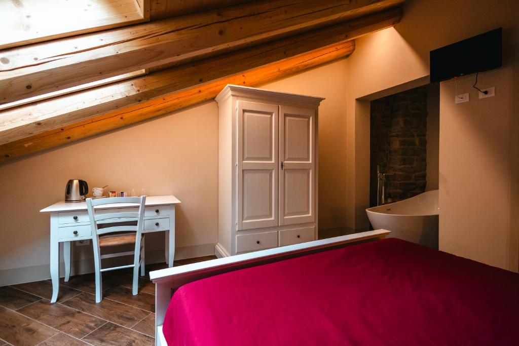 Postel nebo postele na pokoji v ubytování Albergo del Bramante