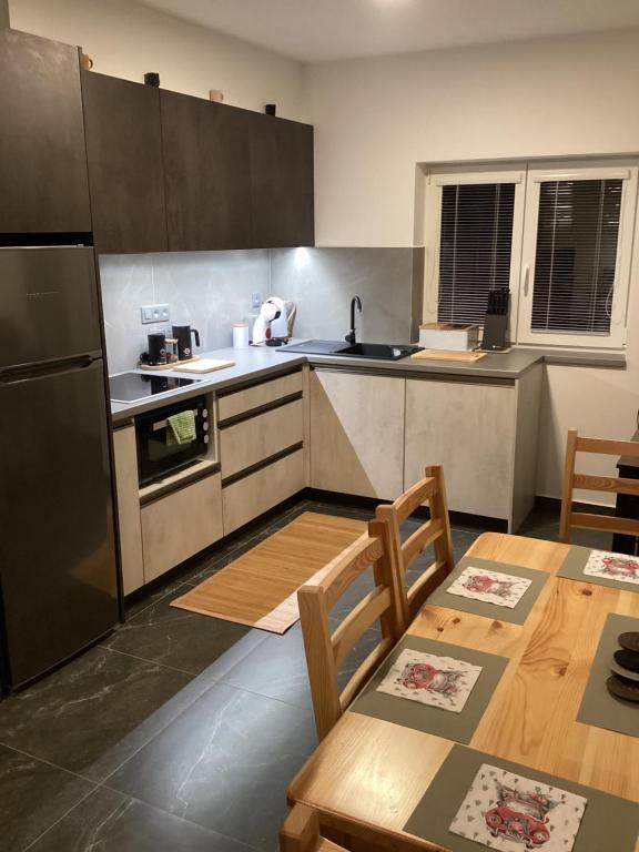 Kuchyň nebo kuchyňský kout v ubytování Apartmány Ořechovka Wellness