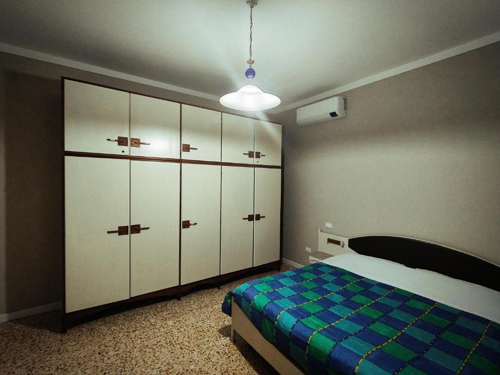 Postel nebo postele na pokoji v ubytování Le Aquile