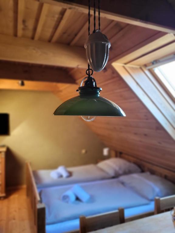 Postel nebo postele na pokoji v ubytování Apartmány Červený Dvůr